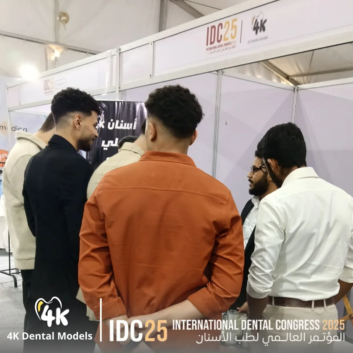 Visitors at the 4K booth during IDC 2025 in Cairo